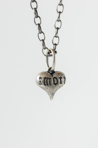 Erica Molinari fine jewelry sterling silver and 14k Gold engraved textured heart shaped charm with "amore vita" inscription on either side in old english font and script, romantic tattoo style necklace, "love life" saying
