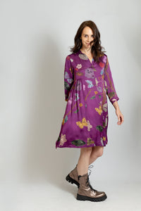 Imported fall fashion by Yavi, Plum button down machine washable shirt dress with pockets, 3/4 sleeves, collar, and whimsical floral print