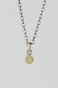 Rene Escobar circular Valery Pendant charm in 18k yellow gold with white diamonds and solid gold bale