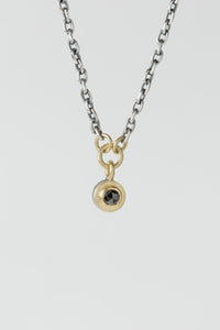 Rene Escobar mixed metal Rose Necklace with small circular pendant featuring Black Diamond 18k Yellow Gold and Sterling Silver