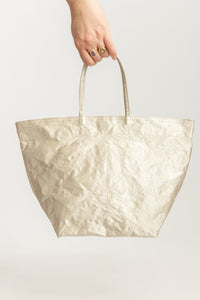 Zilla Italian women's structural handbag in a unique trapezoid shape and light beige, sand colored satin